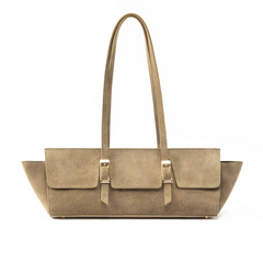 A taupe-brown suede tote bag with long shoulder straps and gold-tone buckle hardware, shown against a plain white background.
