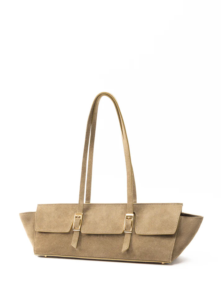 A structured taupe-brown suede handbag with dual shoulder straps and gold-tone buckle details, shown against a plain white background.